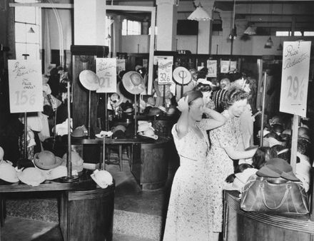Shoppers in the Hat department of C M Ross Co Ltd.