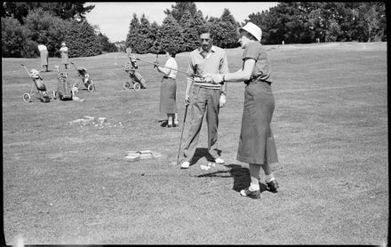 Men and Women Practicing Golf Swings - Resource cover image