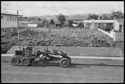 Parked roading grader - Resource cover image