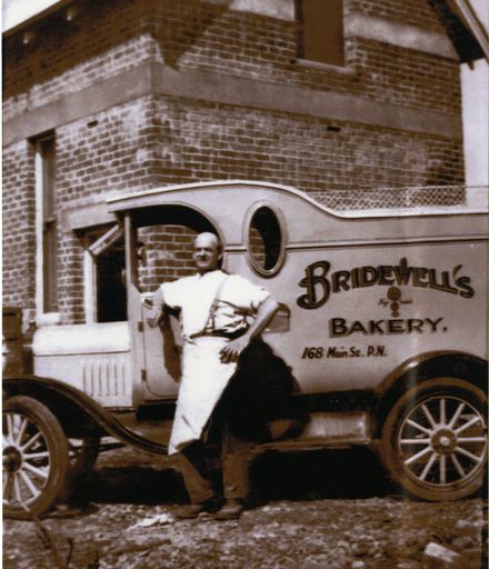 Reginald Bridewell with van in front of Bridewell's Bakery