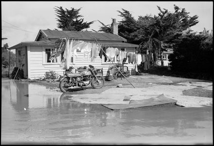"Cleaning up After the Devastation" - Flooding