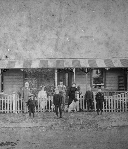 James Linton and family outside their home, Terrace End