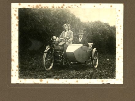 Couple on Motorcycle with Sidecar