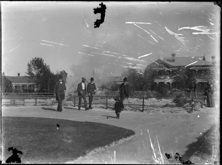 People in front of thermal pool and the Grande Vue Private Hotel,  Rotorua