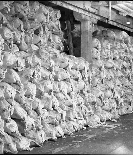 Carcasses stacked at Longburn Freezing Works