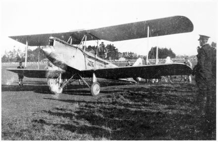 People inspecting an aeroplane