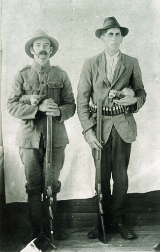 Joe Marston and George Fitzgerald with pet ferrets