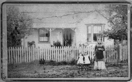 Woolcock family outside their house in Rangitikei Street