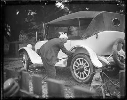 Man cleaning car