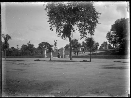 Woman walks past Albert Park