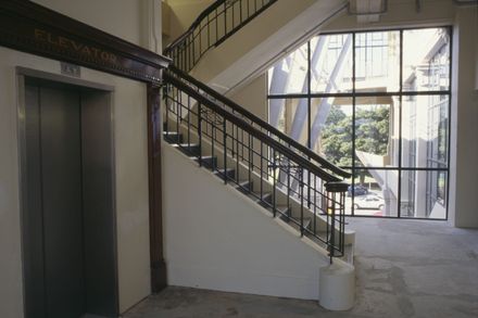 Palmerston North City Library stairwell and lift, 1st floor.