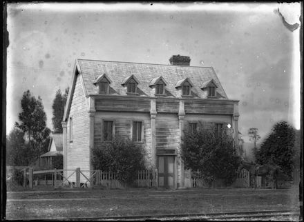 Unidentified House next to a Railway Line