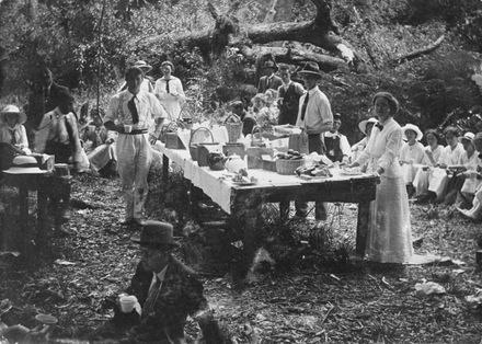 Picnickers around an outdoor table