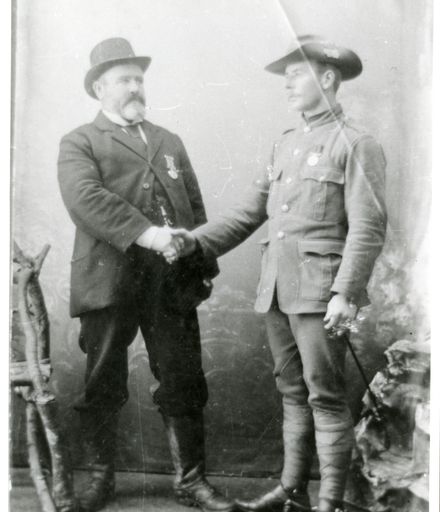 Soldier and Man Shaking Hands