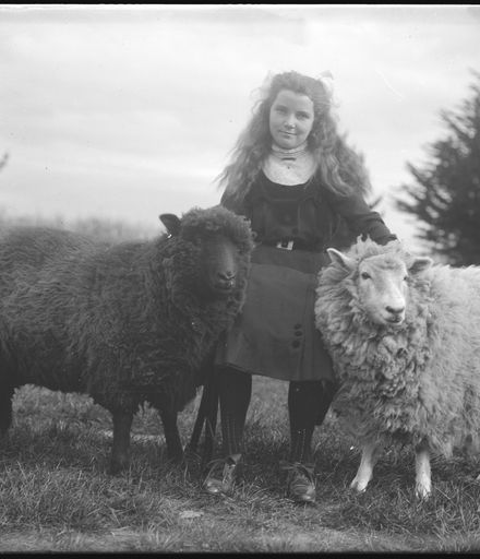Young Woman with Pet Sheep