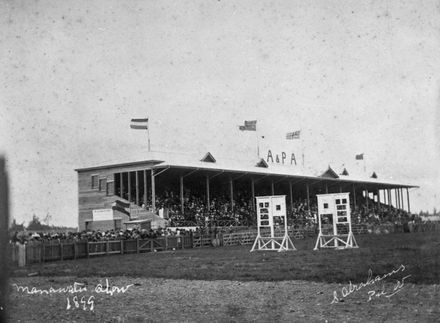 Crowd in grandstand at Agricultural and Pastoral Association show.