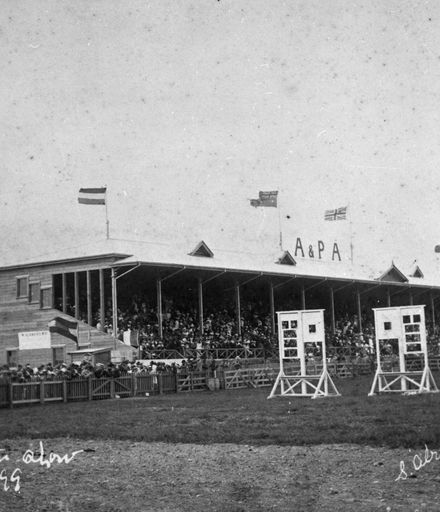 Crowd in grandstand at Agricultural and Pastoral Association show.