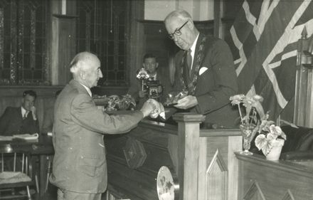 Presentation to H Greenwood by Mr W B Tennent, Mayor