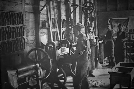 Workers inside Johansen and Company bootmaking factory