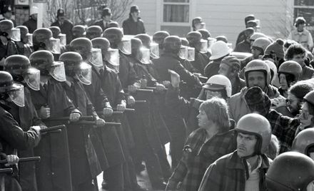 Protesters challenge police lines
