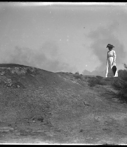 Woman Standing on Hill