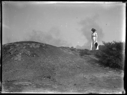 Woman Standing on Hill