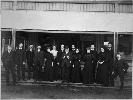 Staff of C M  Ross Co Ltd outside the store