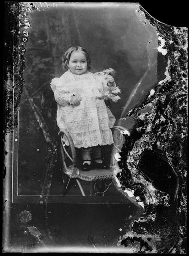 Toddler with Doll