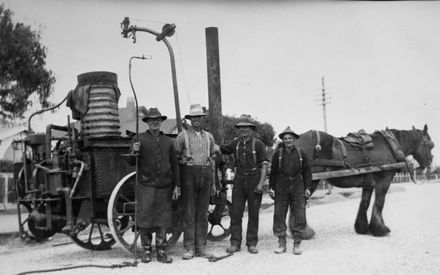 City workmen and road tarring machine