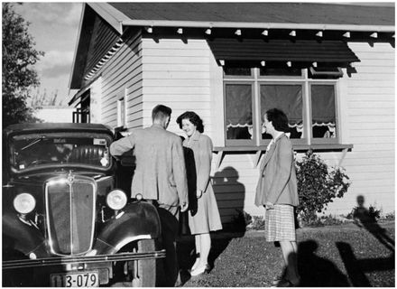 Evans Family Collection: Jack and Betty Evans leaving for a social evening with friends