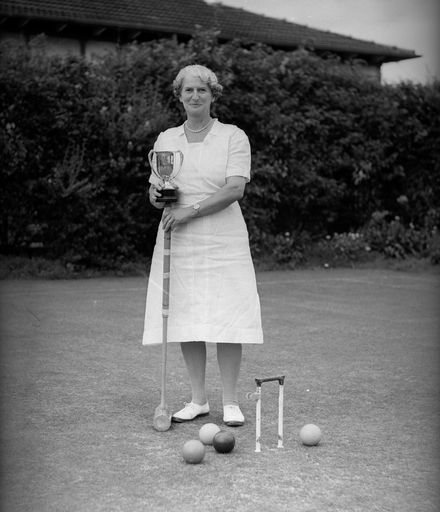 Unidentified Woman Holding Trophy