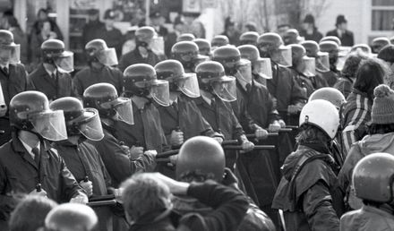 Protesters challenge police lines