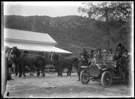 Group of People with Car and Horse Cart