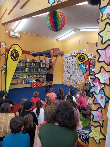 Strong Man Stan performs at Awapuni Library