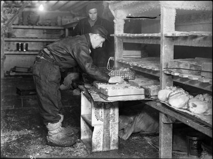 Workmen in the freezer, Longburn Freezing Works
