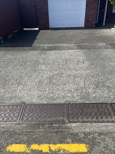 Stop the Tour Graffiti on Cuba Street Stop the Tour Graffiti on Cuba Street