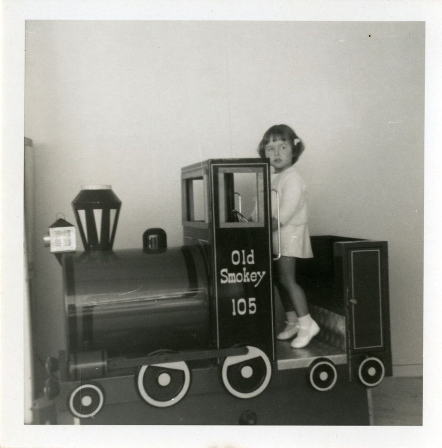 Child with 'Old Smokey' at the Pioneer Village shopping centre