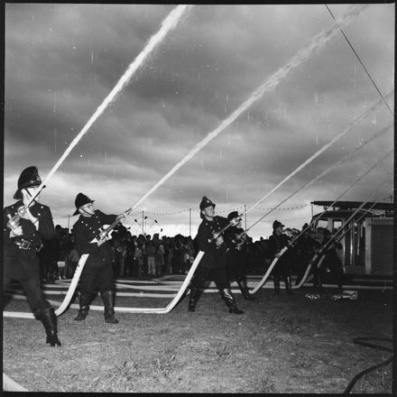 "Firemen Lend Reality To Display"