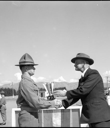 War Veteran Presents a Trophy to a Soldier, 23rd Intake, Central District Training Depot, Linton