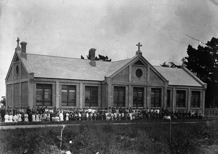 Pupils and teachers outside St Patricks School