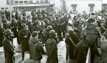 Protesters challenge police lines