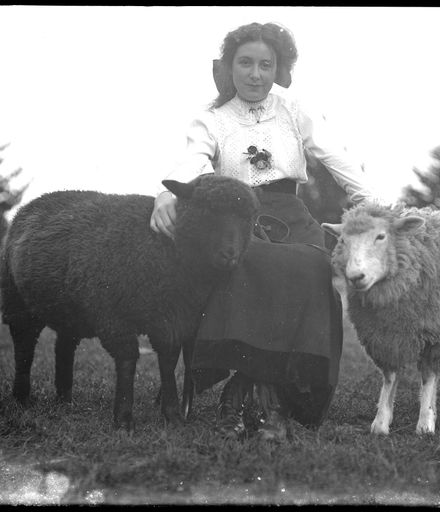 Young Woman with Pet Sheep