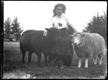 Young Woman with Pet Sheep