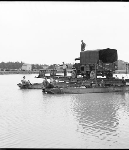 "Versatile Engineers Show Their Paces" - Army Engineers Ferrying Three-Ton Truck by Raft