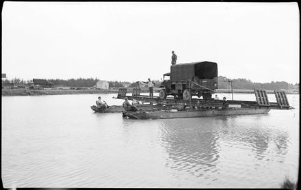 "Versatile Engineers Show Their Paces" - Army Engineers Ferrying Three-Ton Truck by Raft