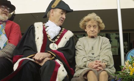 Madge Allsop greeted by Mayor Paul Rieger