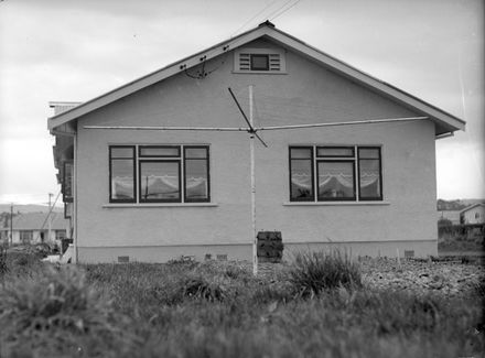 House with Clothesline in Front
