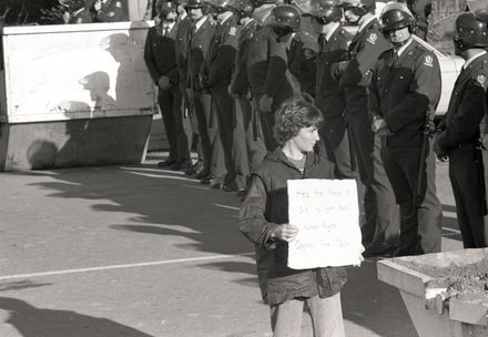 Protesters challenge police lines