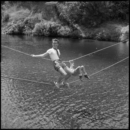 "Great Life for Boys at Scout Camp" Crossing a Monkey Bridge