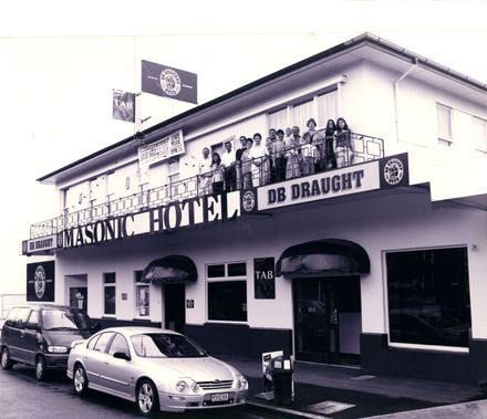 Group on the verandah of the Masonic Hotel